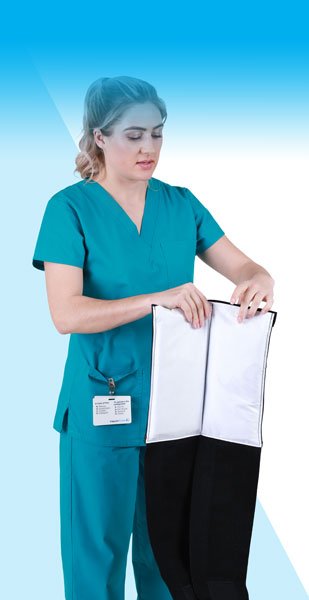Nurse Securing Velcro Tabs on an SMI Wrap